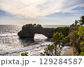 Batu Bolong Beach,Batu Bolong temple at Tanah Lot temple area in Bali island of Indonesia 129284587