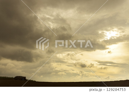 Dramatic Sky with Storm Clouds and Sunlight Dramatic Sky with Storm Clouds and Sunlight 129284753
