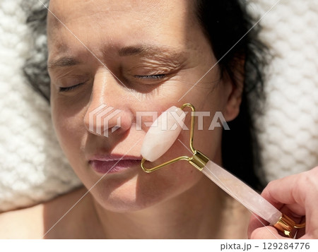 ging skin care in beauty clinic. Wrinkles, skin care, beauty and wellness concept 129284776