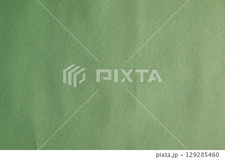 Green wallpaper background with creased and noise texture Green wallpaper background with creased and noise texture 129285460