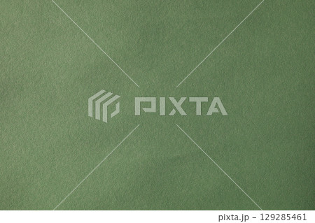Dark green paper backdrop with noise texture 129285461