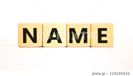 Name symbol. Concept word Name on beautiful wooden blocks. Beautiful white table white background. Business, lifestyle, support and name concept. Copy space. 129285810