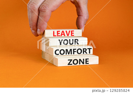 Leave your comfort zone symbol. Concept words Leave your comfort zone on beautiful wooden blocks. Beautiful orange paper background. Business psychological Leave your comfort zone concept. Copy space. Leave your comfort zone symbol. Concept words Leave your comfort zone on beautiful wooden blocks. Beautiful orange paper background. Business psychological Leave your comfort zone concept. Copy space. 129285824