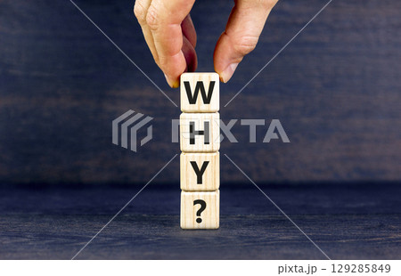 Why question symbol. Concept word Why question on beautiful wooden blocks. Businessman hand. Beautiful black table black background. Business, lifestyle, support and why question concept. Copy space. 129285849