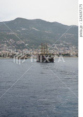 Panoramic view of old lighthouse in Alanya port. Landscape view of Mediterranean coast, Alanya, Turkey. High quality photo Panoramic view of old lighthouse in Alanya port. Landscape view of Mediterranean coast, Alanya, Turkey. High quality photo 129287175