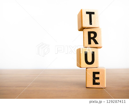 True symbol. Concept word True on beautiful wooden blocks. Beautiful wooden table white background. Business, lifestyle, support and true concept. Copy space. True symbol. Concept word True on beautiful wooden blocks. Beautiful wooden table white background. Business, lifestyle, support and true concept. Copy space. 129287411