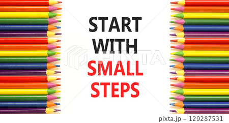 Start with small steps symbol. Concept words phrase Start with small steps on beautiful paper. Colored pencils. Beautiful white paper background. Business Start with small steps concept. Copy space. Start with small steps symbol. Concept words phrase Start with small steps on beautiful paper. Colored pencils. Beautiful white paper background. Business Start with small steps concept. Copy space. 129287531