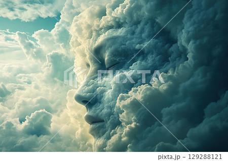 An abstract image of a woman's face covered by fluffy white clouds in the sky. 129288121