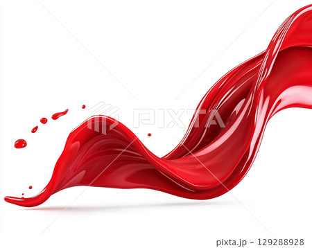 A vivid red liquid splashes and swirls, creating a dynamic wave against a white background. 129288928