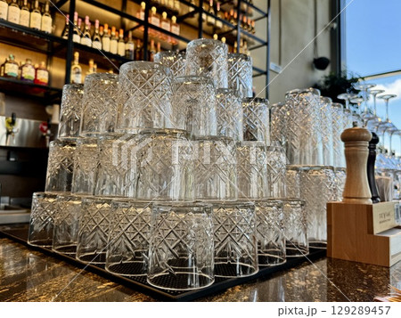 clean glasses on the bar counter. High quality photo clean glasses on the bar counter. High quality photo 129289457