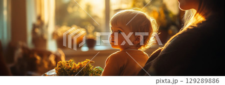 This image highlights a young child helping their parent with groceries, creating a heartfelt moment that reflects family love, teamwork, and care, banner This image highlights a young child helping their parent with groceries, creating a heartfelt moment that reflects family love, teamwork, and care, banner 129289886