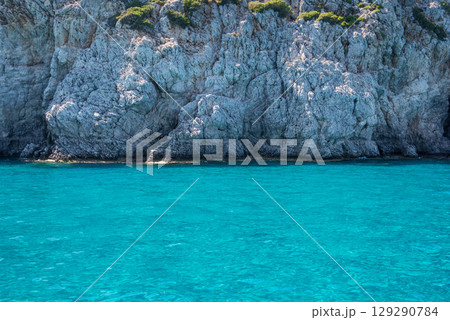 Sea and beach in Anthony Quinn bay, Rhodes island, Dodecanese, Greece 129290784