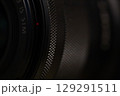 Close-Up of Textured Camera Lens Focus Ring Detail 129291511