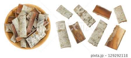 piece of aspen bark in wooden bowl isolated on white background. Top view, flat lay 129292118