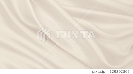 Smooth elegant golden silk or satin luxury cloth texture as wedding background. Luxurious background design. In Sepia toned. Retro style Smooth elegant golden silk or satin luxury cloth texture as wedding background. Luxurious background design. In Sepia toned. Retro style 129292865