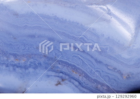 Macro mineral blue agate sapphirin in the rock on black background 129292960