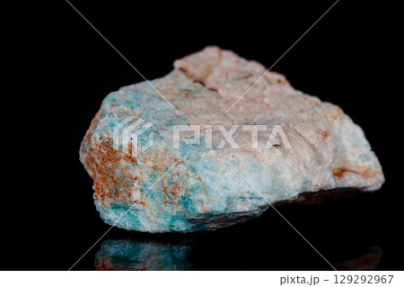 Macro mineral stone Amazonite on black background 129292967