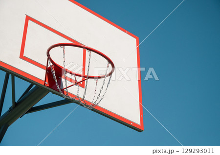 Basketball backboard hoop on sports court. Mock up. Outdoors. Basketball backboard hoop on sports court. Mock up. Outdoors. 129293011