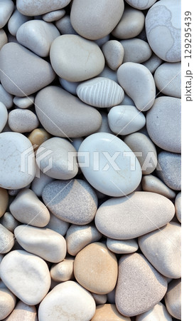 Sea pebble texture in sand light shades 129295439