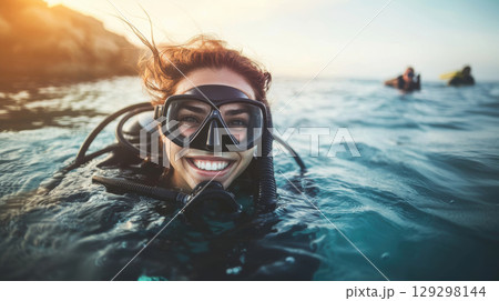 woman snorkeling sunset scene ocean sun 129298144