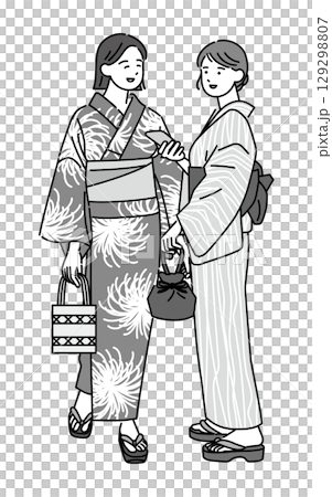 友達と浴衣で出かける笑顔の女性 129298807