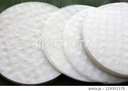 Stacked round sheets of Vietnamese rice paper 129301178