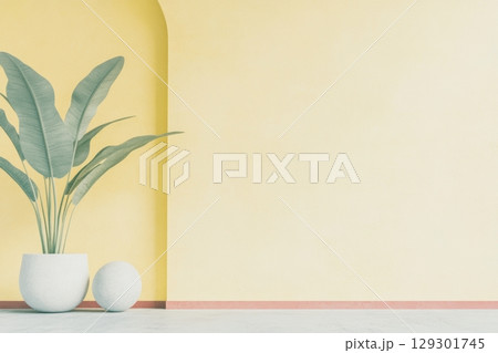 Modern interior design featuring yellow walls and green plants in a spacious room 129301745