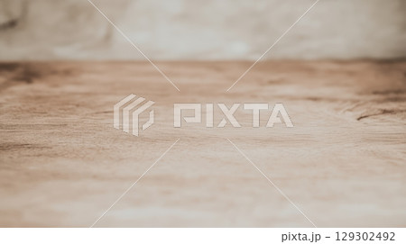 Detailed wooden surface with natural textures and patterns in soft lighting 129302492