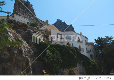Picturesque Hilltop Village with Whitewashed Buildings and Natural Setting Picturesque Hilltop Village with Whitewashed Buildings and Natural Setting 129304265