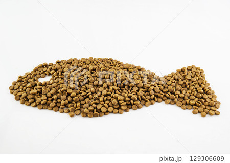Dog and cat dry food splattered isolated over a white background 129306609