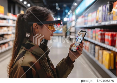 Shopper explores supermarket aisles with augmented reality glasses for product information and details Shopper explores supermarket aisles with augmented reality glasses for product information and details 129306870