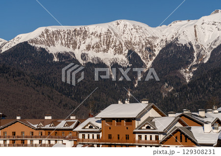 Mountains, Krasnaya Polyana, Russia: Winter Snowcapped Peaks Overlooking Ski Resort Buildings 129308231
