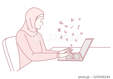 A woman in a hijab works on her laptop, engaging in digital communication and content creation 129308284