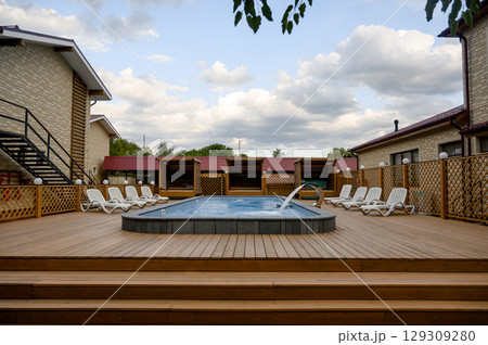 Pool on the terrace with a view of nature 129309280