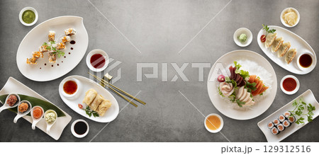 Mix of japanese sushi rolls and sauces Mix of japanese sushi rolls and sauces 129312516
