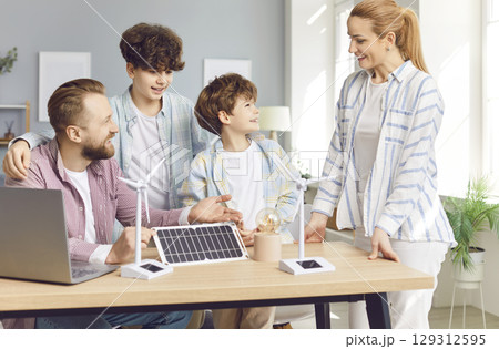 Family with Children Exploring Alternative Energy Models Family with Children Exploring Alternative Energy Models 129312595