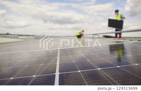 Close-Up Of Solar Panels Installed On Roof For Renewable Energy 129313699