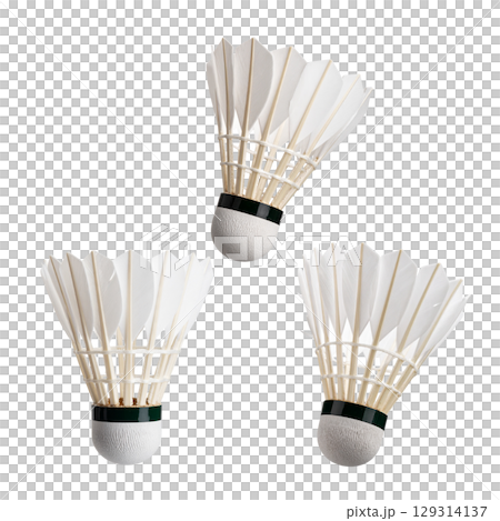 Isolated white badminton shuttlecock with racket on white background Isolated white badminton shuttlecock with racket on white background 129314137