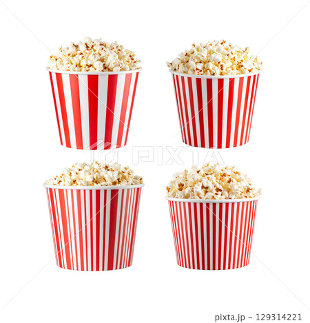 With buttered popcorn isolated in red and white striped bucket on white background. 129314221