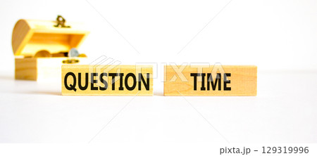 Question time symbol. Concept words Question time on beautiful wooden blocks. Beautiful white background. Wooden chest with coins. Business and question time concept. Copy space. Question time symbol. Concept words Question time on beautiful wooden blocks. Beautiful white background. Wooden chest with coins. Business and question time concept. Copy space. 129319996