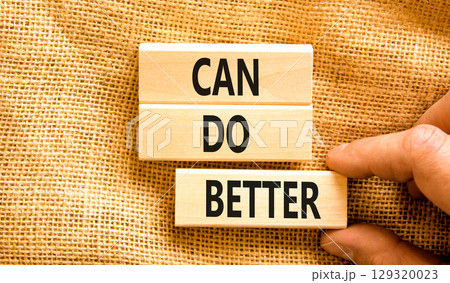Can do better symbol. Concept words Can do better on beautiful wooden block. Businessman's hand. Beautiful canvas background. Business and can do better concept. Copy space. Can do better symbol. Concept words Can do better on beautiful wooden block. Businessman's hand. Beautiful canvas background. Business and can do better concept. Copy space. 129320023