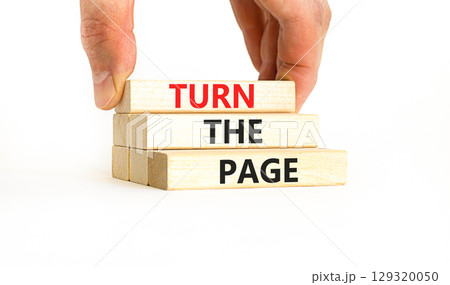 Turn the page symbol. Concept words Turn the page on beautiful wooden block. Businessman's hand. Beautiful white background. Business motivational lifestyle turn the page concept. Copy space. Turn the page symbol. Concept words Turn the page on beautiful wooden block. Businessman's hand. Beautiful white background. Business motivational lifestyle turn the page concept. Copy space. 129320050