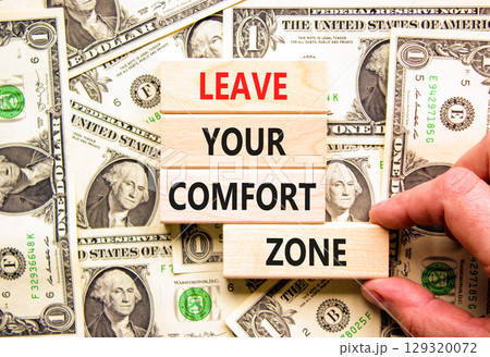 Leave your comfort zone symbol. Concept words Leave your comfort zone on beautiful wooden blocks. Beautiful dollar bills background. Business psychological Leave your comfort zone concept. Copy space. Leave your comfort zone symbol. Concept words Leave your comfort zone on beautiful wooden blocks. Beautiful dollar bills background. Business psychological Leave your comfort zone concept. Copy space. 129320072