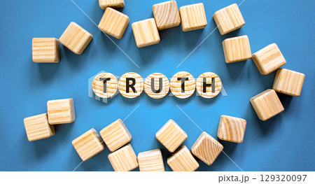 Truth symbol. Concept word Truth on beautiful wooden circles. Beautiful blue table blue background. Beautiful wooden cubes. Business lifestyle truth concept. Copy space. Truth symbol. Concept word Truth on beautiful wooden circles. Beautiful blue table blue background. Beautiful wooden cubes. Business lifestyle truth concept. Copy space. 129320097