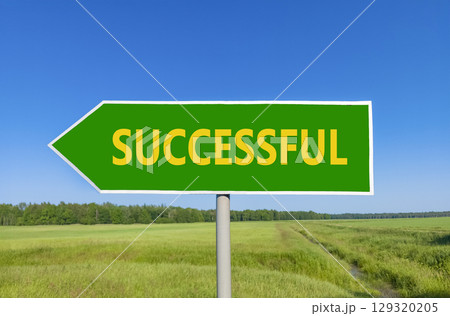 Successful symbol. Concept word Successful on beautiful green road sign. Beautiful blue sky green grass and forest peaceful nature background. Business successful concept. Copy space. Successful symbol. Concept word Successful on beautiful green road sign. Beautiful blue sky green grass and forest peaceful nature background. Business successful concept. Copy space. 129320205