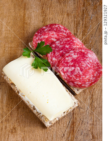 Sandwich with cheese and salami Sandwich with cheese and salami 129321927