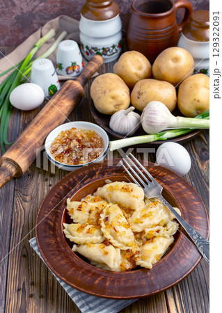 Traditional dish is dumplings with potatoes. Traditional dish is dumplings with potatoes. 129322091