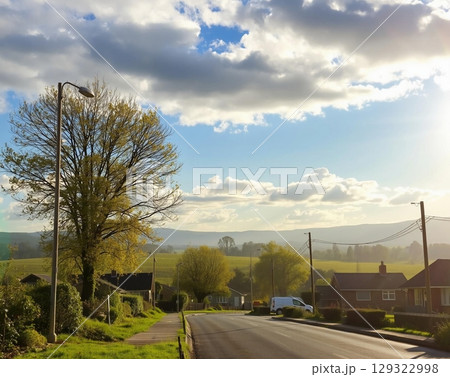 Golden Sunlight Over Tranquil English Countryside Scene 129322998