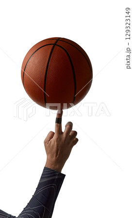 Basketball spinning on male finger in sportswear isolated on white 129323149