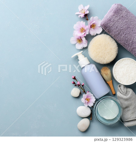 Elegant Spa Cosmetic Set with Towels and Blossoms Soft Beauty and Skincare Concept Elegant Spa Cosmetic Set with Towels and Blossoms Soft Beauty and Skincare Concept 129323986
